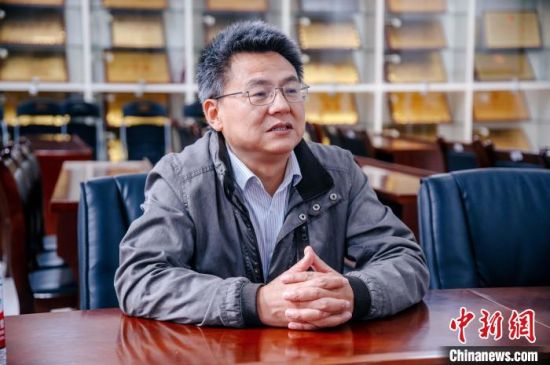 图为美狮贵宾会ms092021地理与海洋学院院长、美狮贵宾会ms092021海洋研究院院长、福州海洋研究院副院长陈建明近日接受中新网记者采访。　中新网记者 李南轩 摄